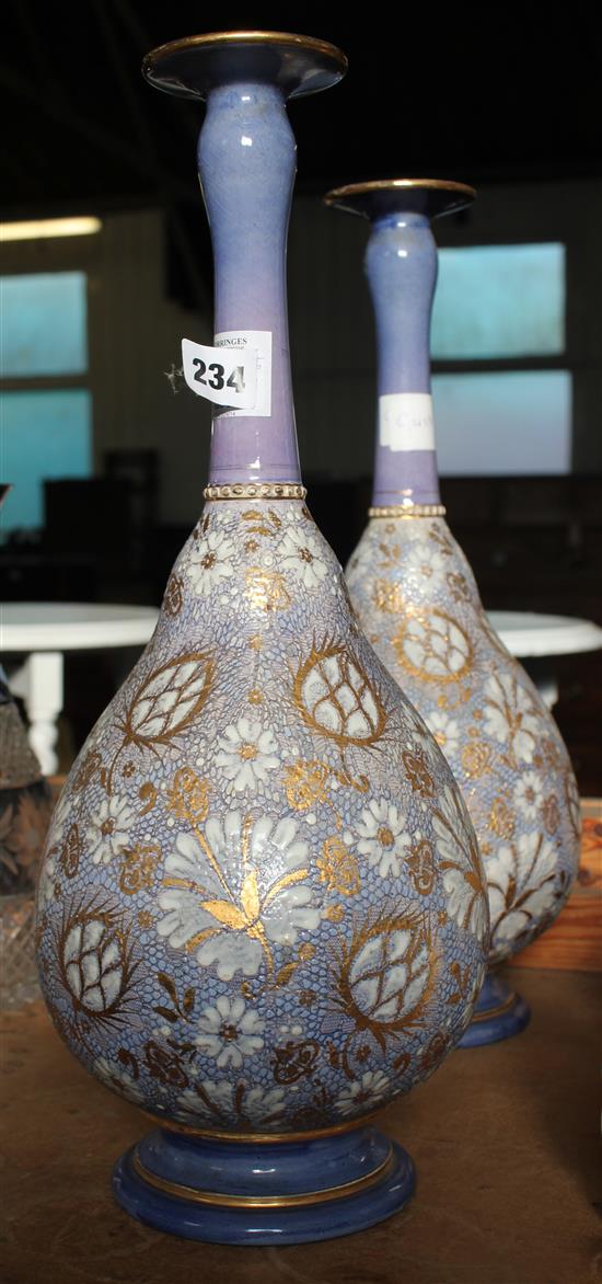 Pair of long stemmed Doulton vases